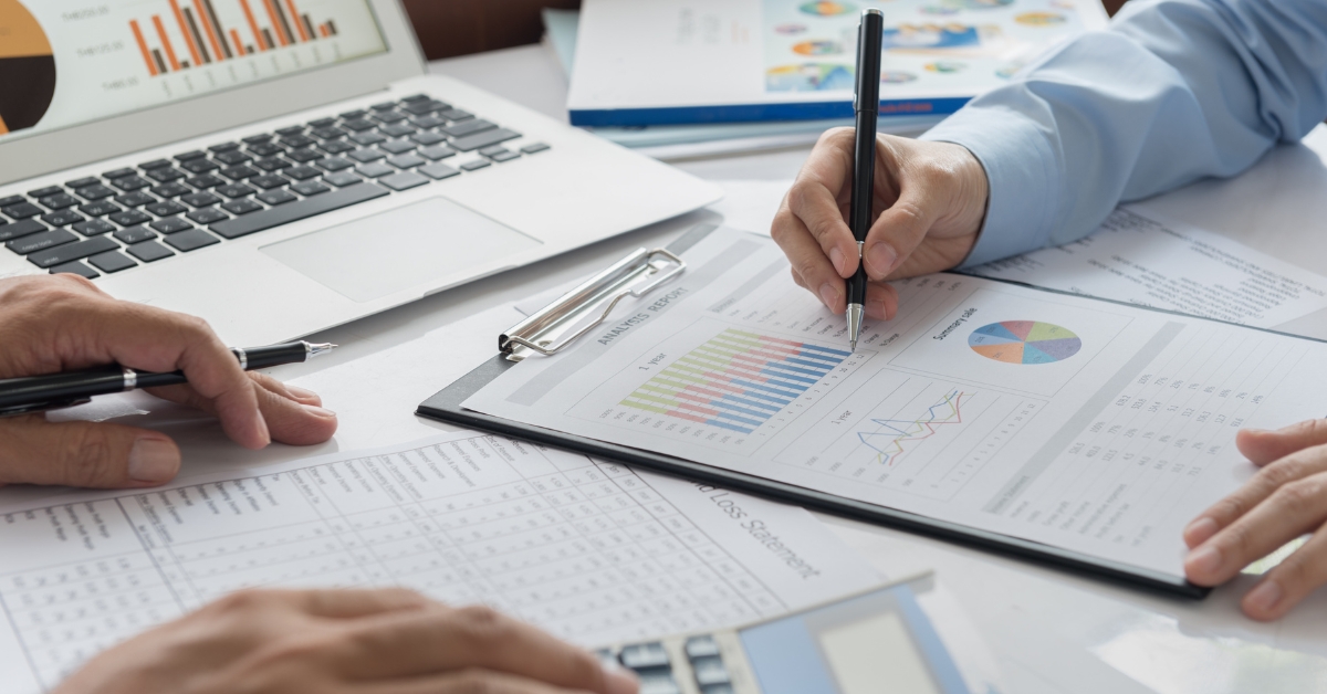 Financial documents, compliance checklist, and reporting tools representing Key Accounting Compliance for Startups in India.