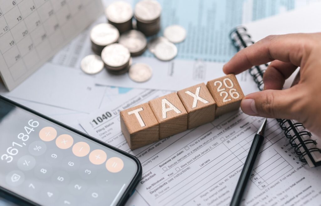 Tax planning vs tax saving for businesses illustrated through financial strategy discussion and tax advisory planning